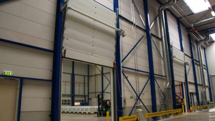 Firedoor with liquid retention barrier