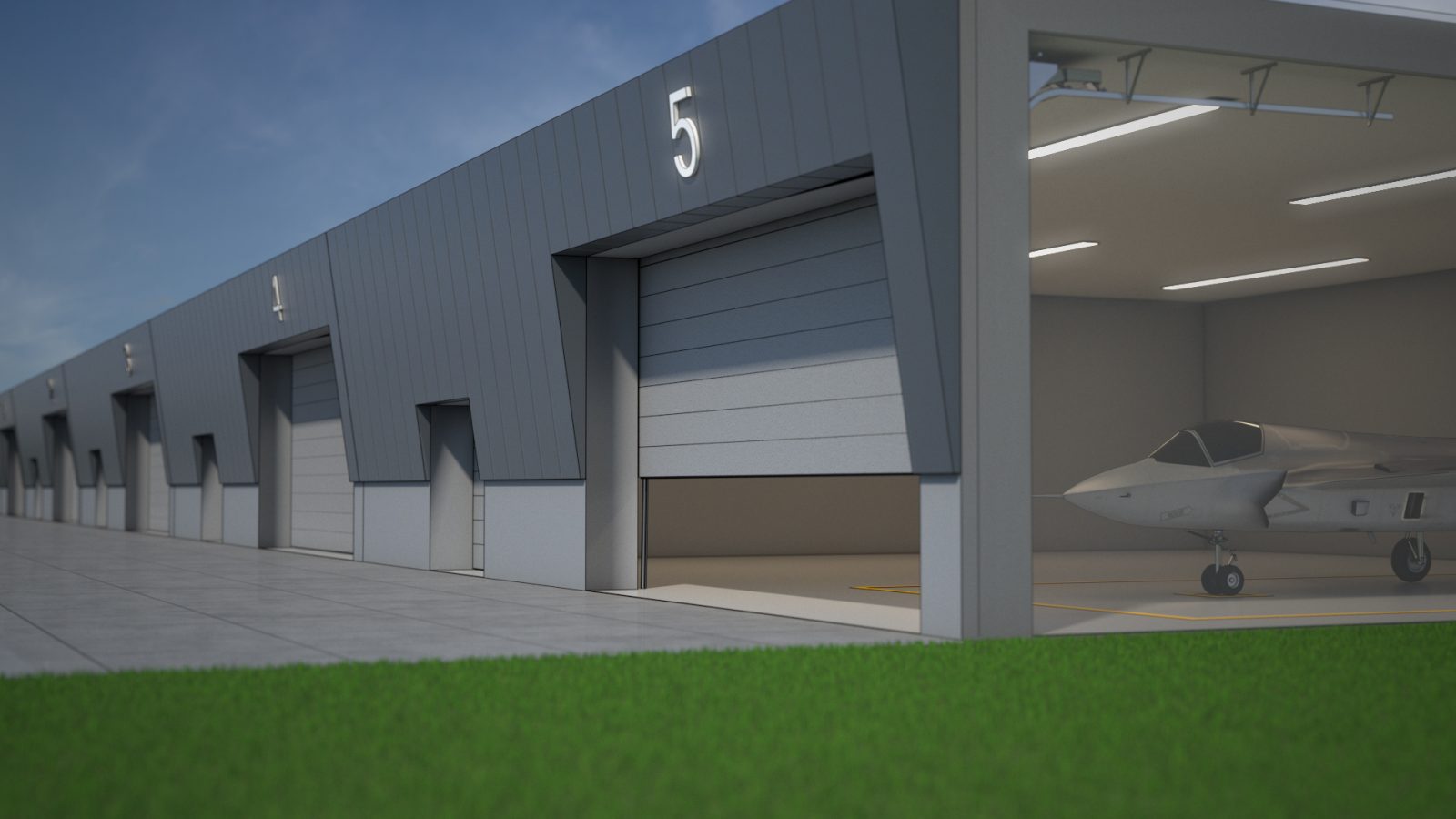 Slide visual: any specification, from design to completion. Showing a visual of security hangar doors at a military airport.